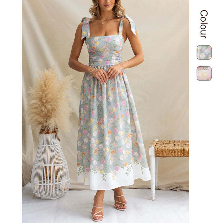 Women's maxi dress with playful straps and floral print