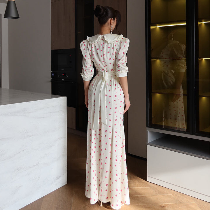 Ladies maxi dress with elegant collar trim and floral accents