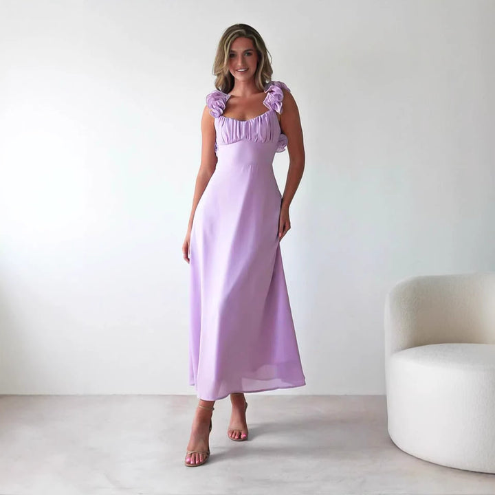 Ladies' maxi dress with playful ruffle details and elastic top