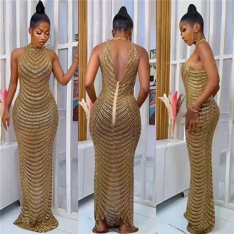 Ladies Glamorous Sequin Maxi Dress with Fitted Cut and Chic Back Cutout