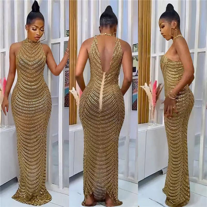 Ladies Glamorous Sequin Maxi Dress with Fitted Cut and Chic Back Cutout