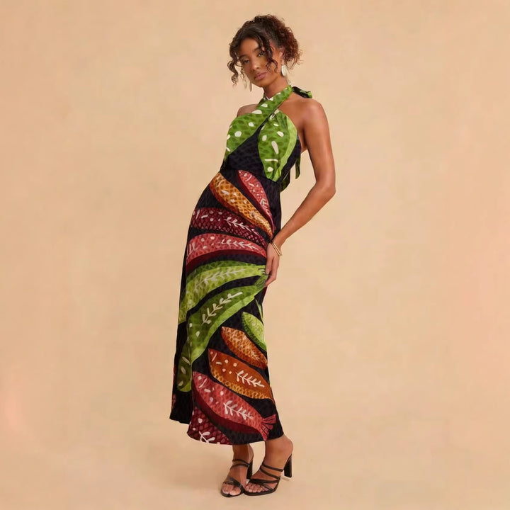 Ladies Halterneck Maxi Dress with Colorful Leaf Design and Flared Cut