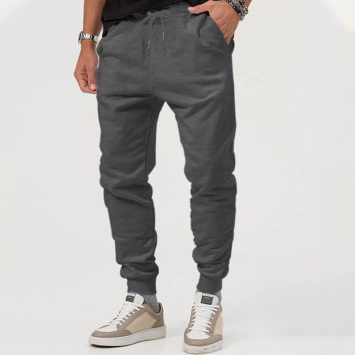 Men's casual jogging pants with elastic waistband and side zip pockets Lisslune
