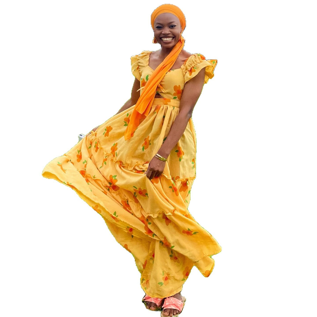 Women's maxi dress with voluminous ruffles and floral accents Lisslune
