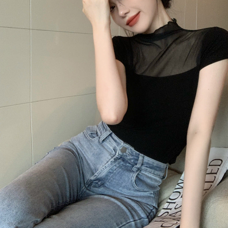 Women's fitted top with transparent mesh inserts and elegant stand-up collar