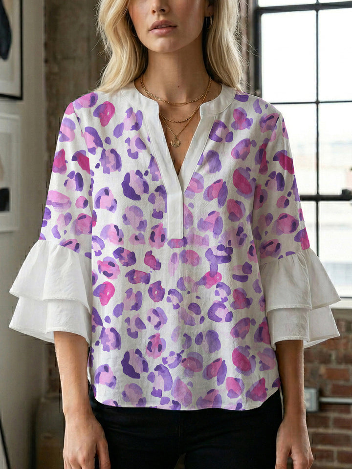 Women's blouse with ruffle details and eye-catching animal print Lisslune
