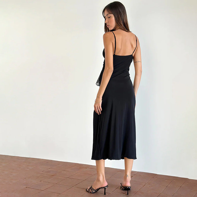 Ladies Elegant Maxi Dress with Playful Ruffle Details and Deep Slit Lune London
