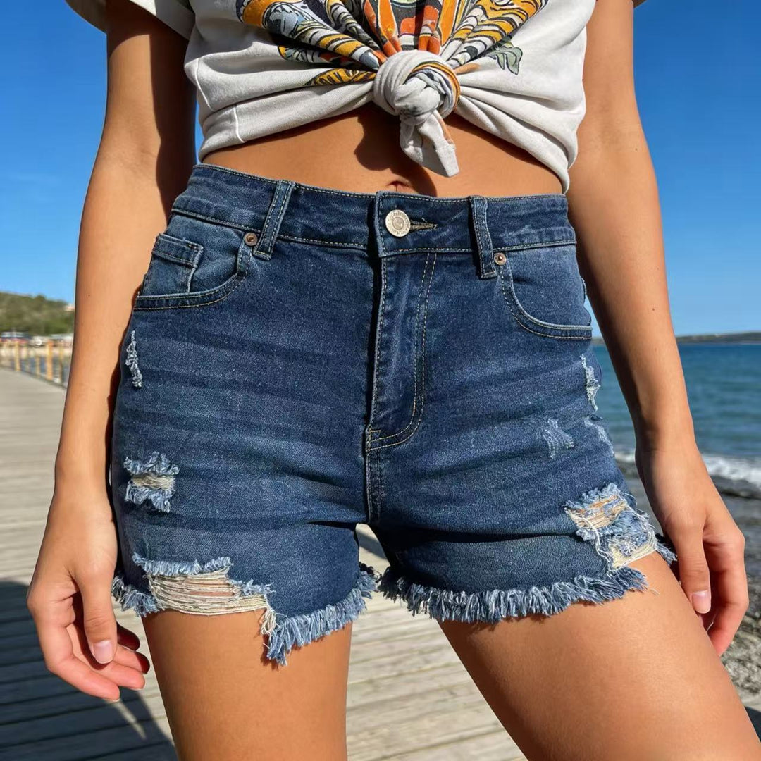 Women's destroyed denim shorts with frayed hem and stylish ripped details Lisslune