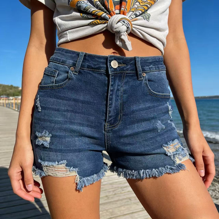 Women's destroyed denim shorts with frayed hem and stylish ripped details Lisslune
