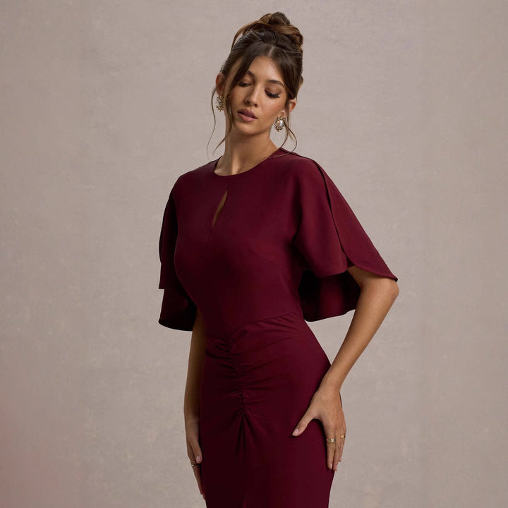 Ladies Elegant Evening Dress with Voluminous Sleeves and Sophisticated Wrap Detail