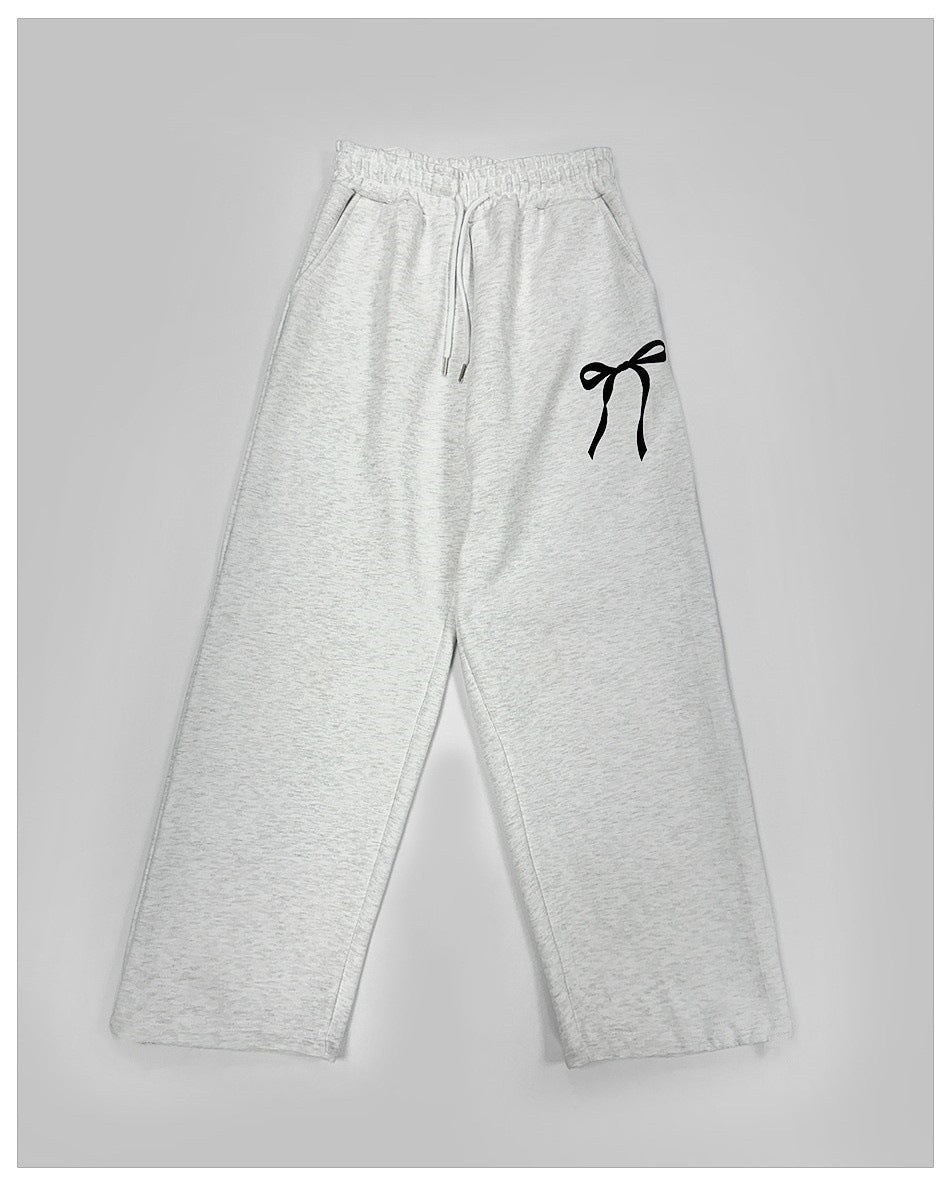 Women's loose leisure pants with elastic waistband and decorative bow motif Lisslune