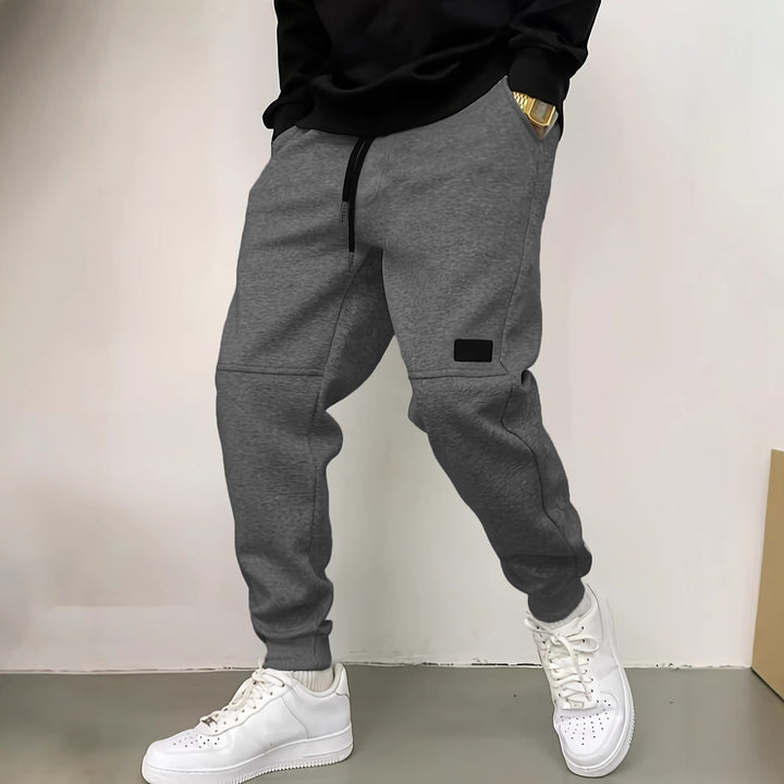 Men's sporty jogging pants with side zipper details Lisslune