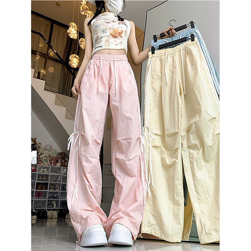 Women’s casual sports pants with side stripes and comfortable drawstring waistband