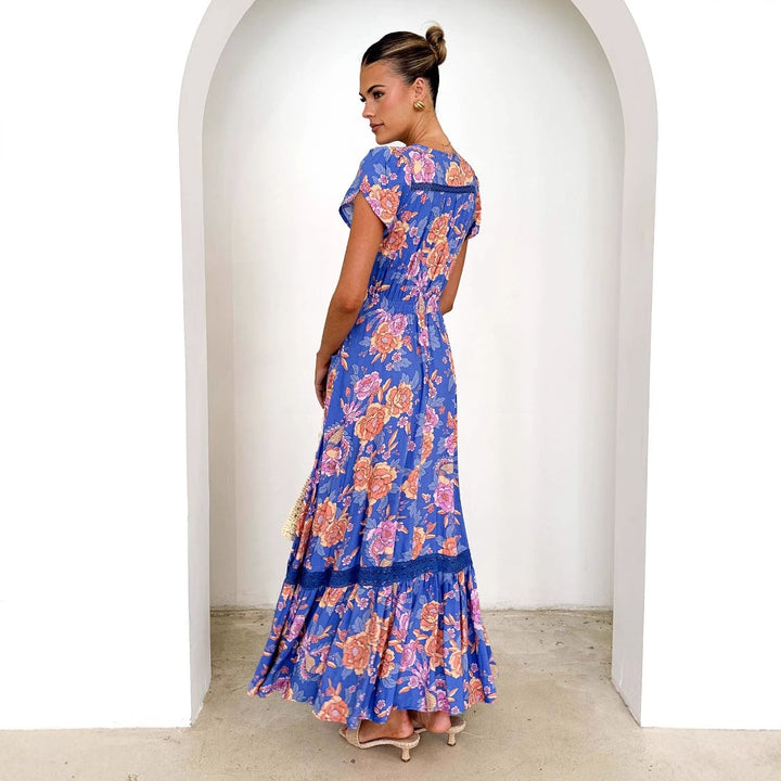 Women's maxi dress with elegant V-neckline and feminine ruffle details