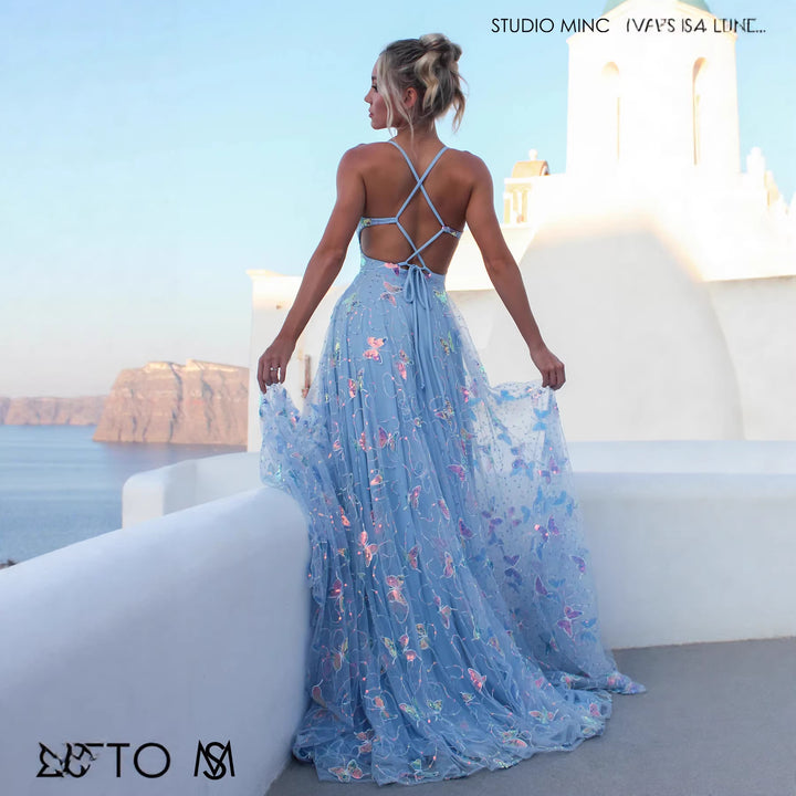 Ladies maxi dress with delicate glitter accents and floral cut