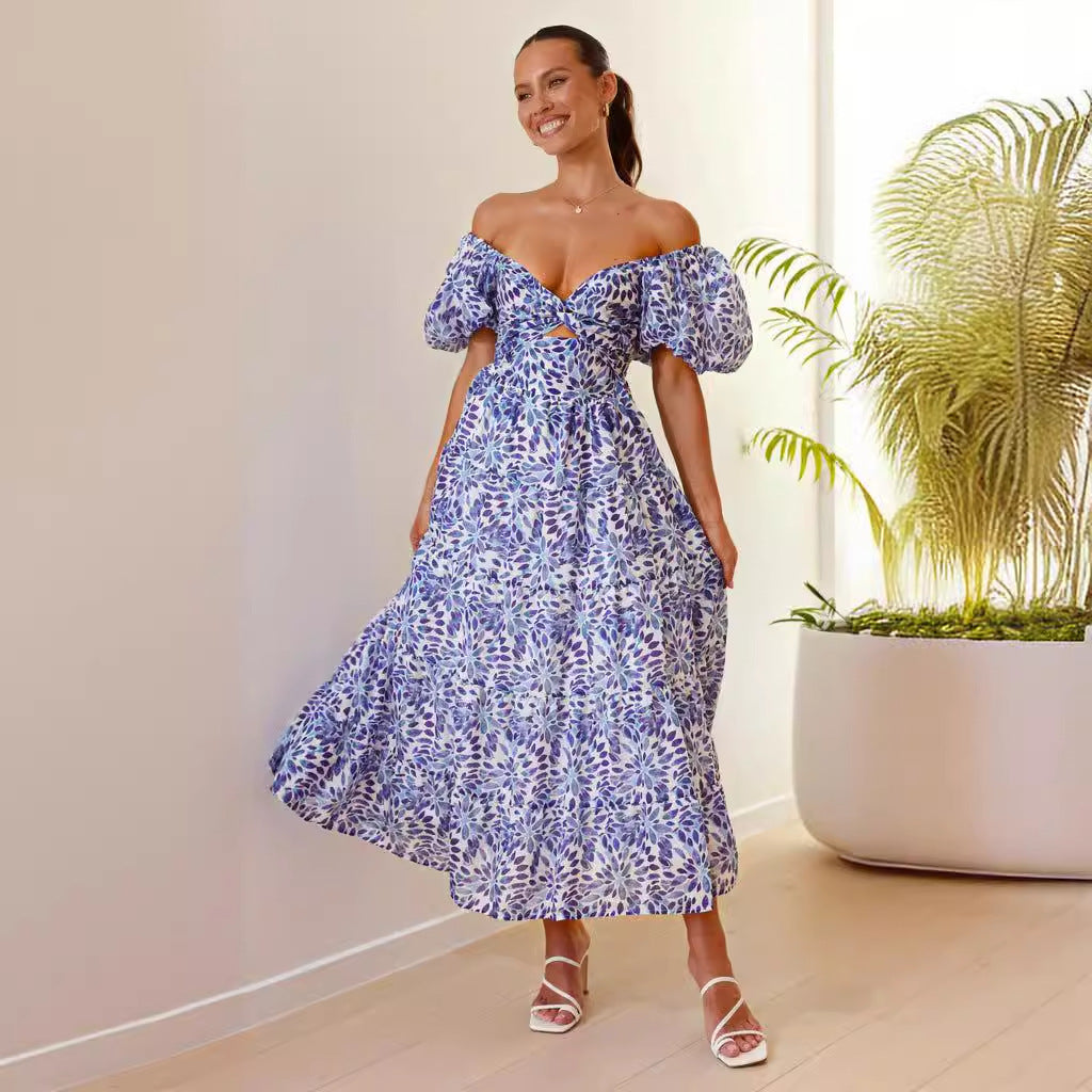 Women's maxi dress with voluminous puff sleeves and floral pattern