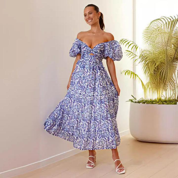 Women's maxi dress with voluminous puff sleeves and floral pattern