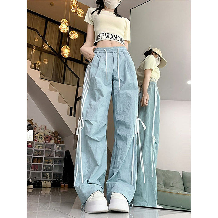 Women’s casual sports pants with side stripes and comfortable drawstring waistband