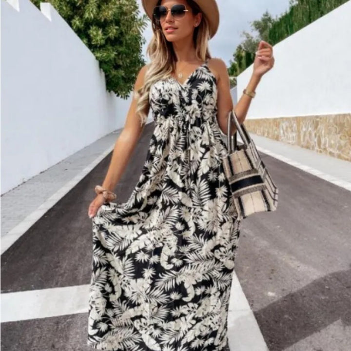 Women's maxi dress with floral wrap design and adjustable waistband