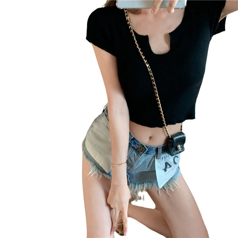Women's short sleeve top with unique V-neckline and modern design