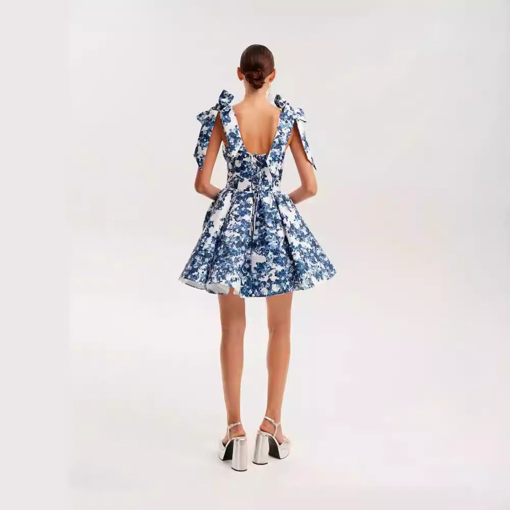 Women's Playful Mini Dress with Floral Design and Sophisticated Straps