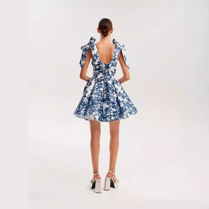 Women's Playful Mini Dress with Floral Design and Sophisticated Straps