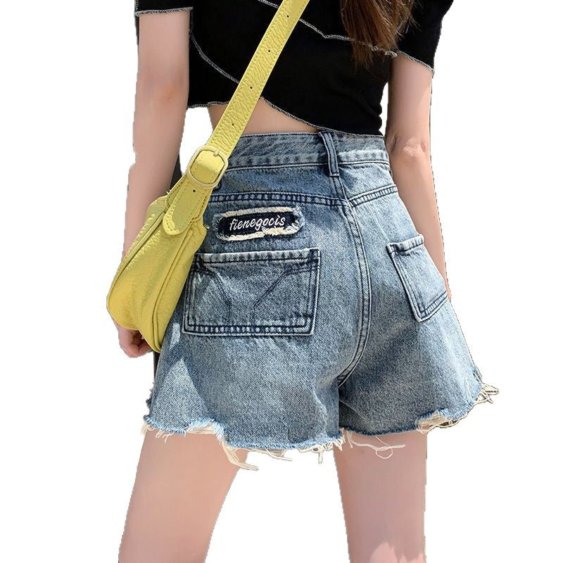 Women's denim shorts with frayed hems and unique embroidery detail Lisslune