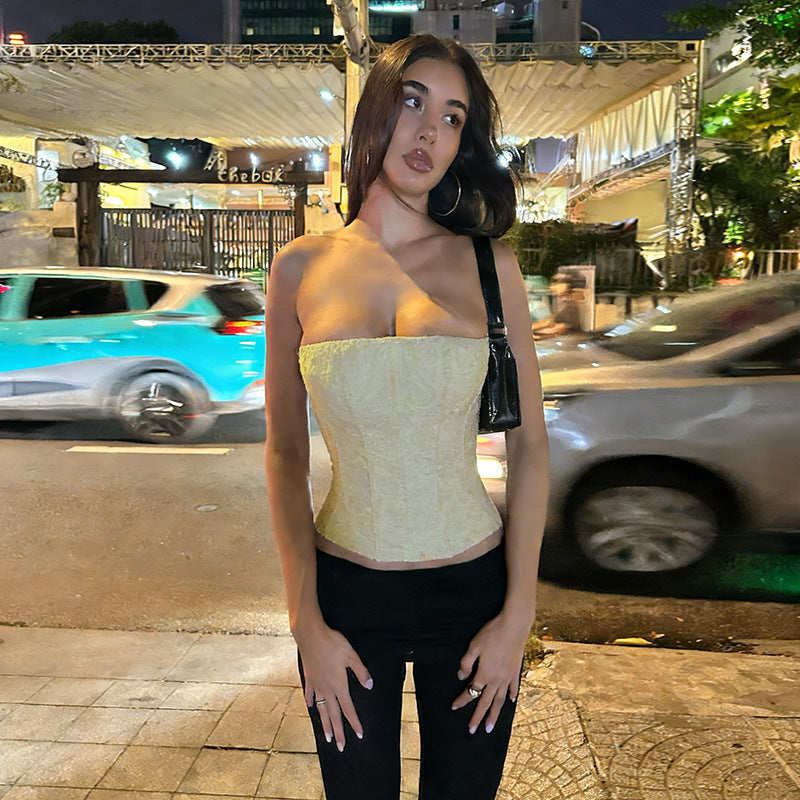 Women's corset top with intricate lace pattern and tailored fit