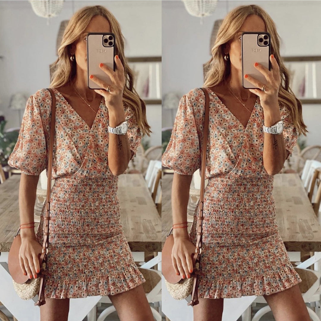 Ladies mini dress with floral ruffles and elastic waistband Lune London