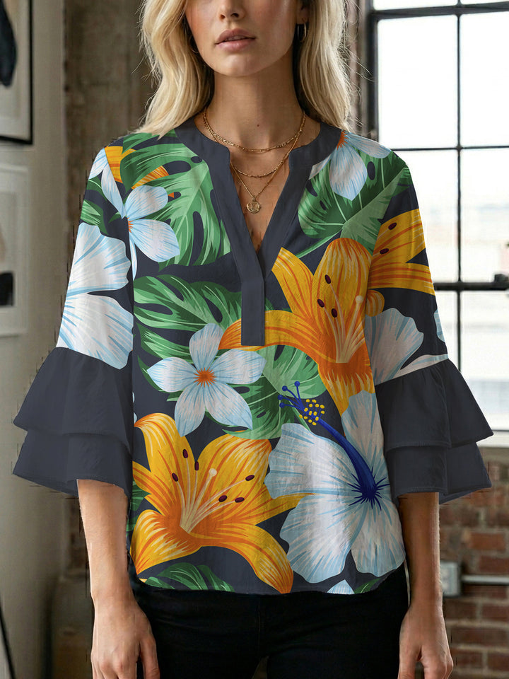 Ladies blouse with voluminous ruffled sleeves and floral print Lisslune