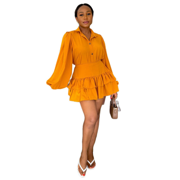 Women's shirt dress with voluminous puff sleeves and flowing skirt