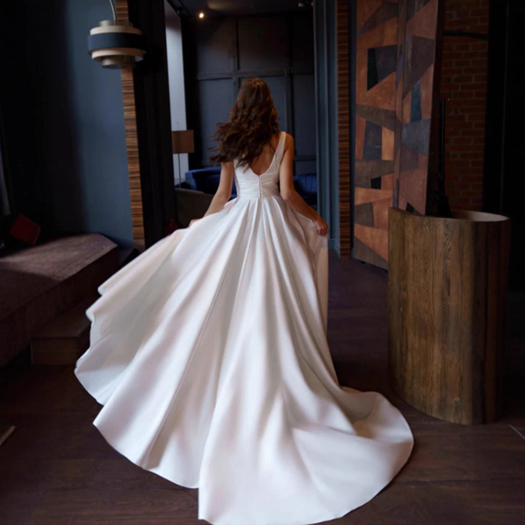 Women's elegant wedding dress with deep V-neckline and side slit