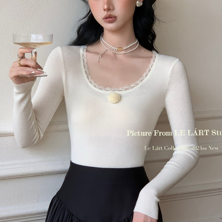 Women's long-sleeve shirt with romantic lace accents and floral details