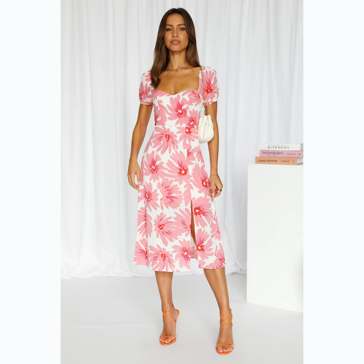 Women’s midi dress with ruffled sleeves and flowing fabric Lune London