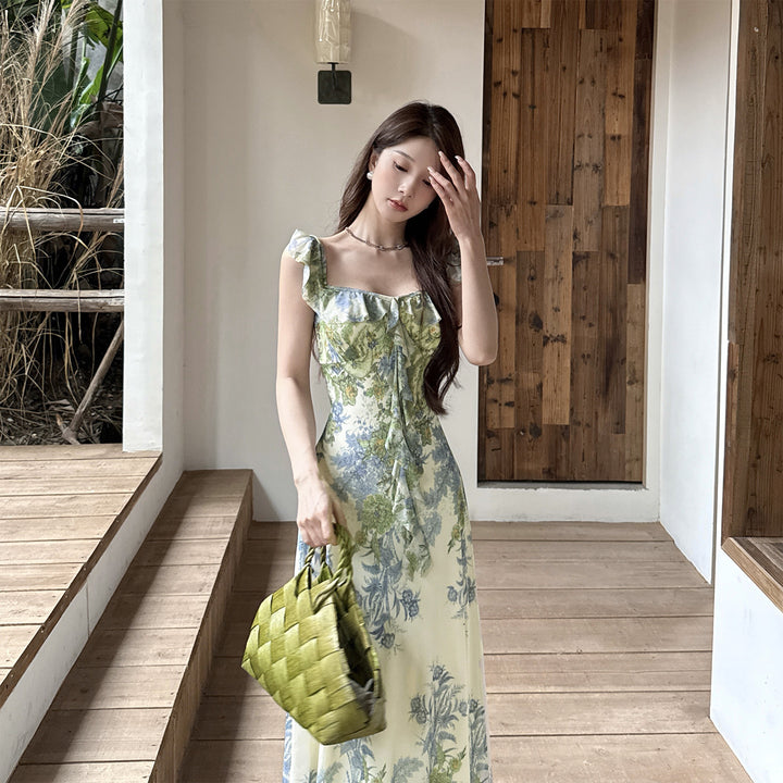 Women's dress with floral ruffle design and figure-hugging cut