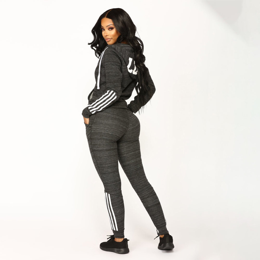 Women's sporty hoodie jumpsuit with elastic waist and modern striped design Lisslune
