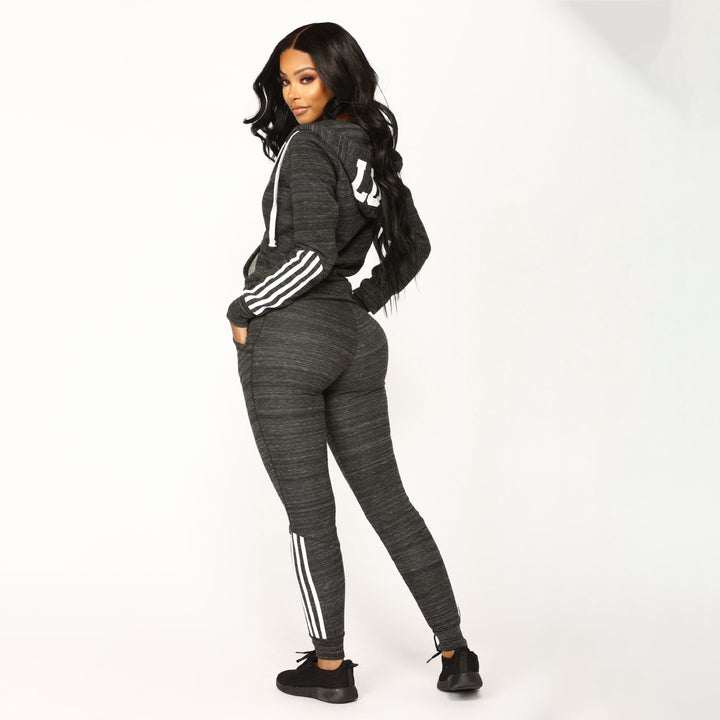Women's sporty hoodie jumpsuit with elastic waist and modern striped design Lisslune