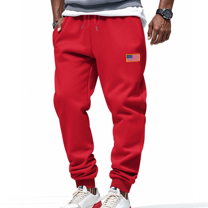 Men's sporty sweatpants with elastic waistband and practical side pockets Lisslune