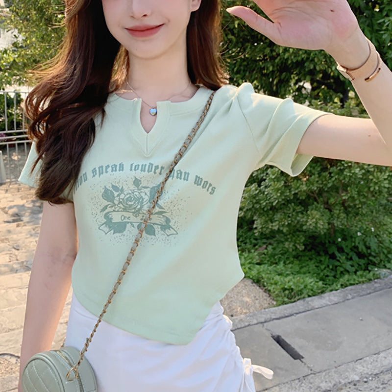 Women’s short sleeve shirt with elegant button design and creative graphic print