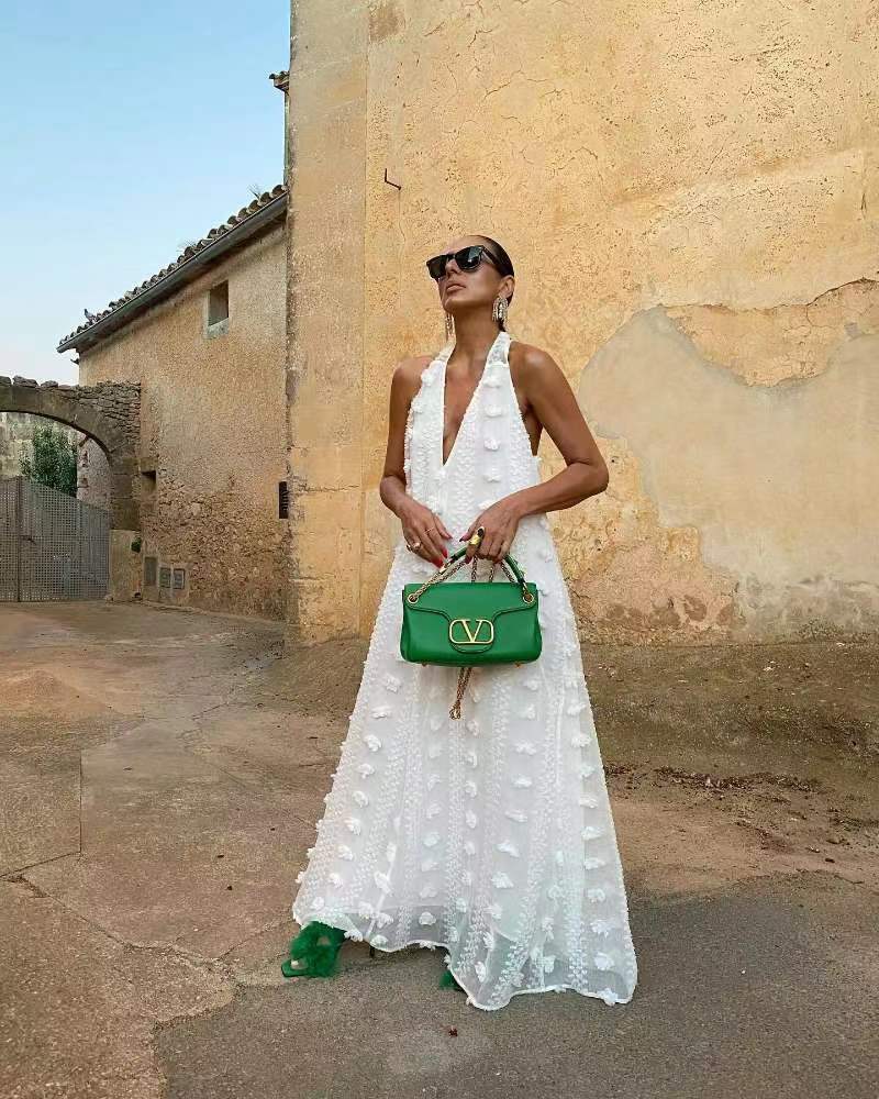 Women's maxi dress with 3D textures and deep V-neck