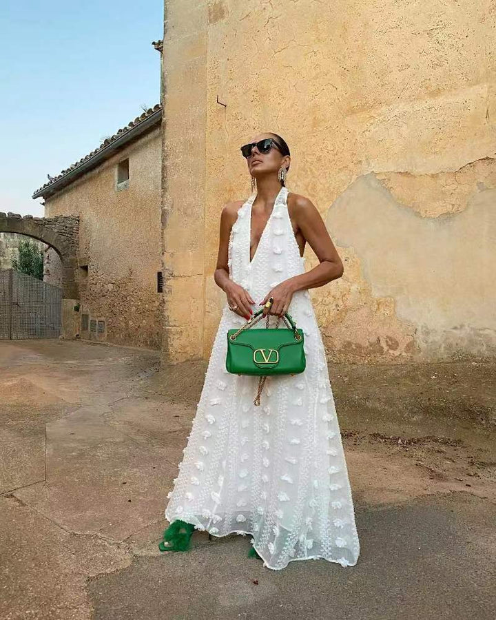 Women's maxi dress with 3D textures and deep V-neck