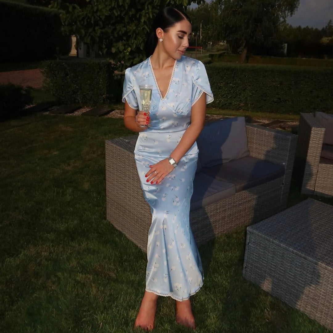 Women's evening dress with elegant V-neck and flowing cut