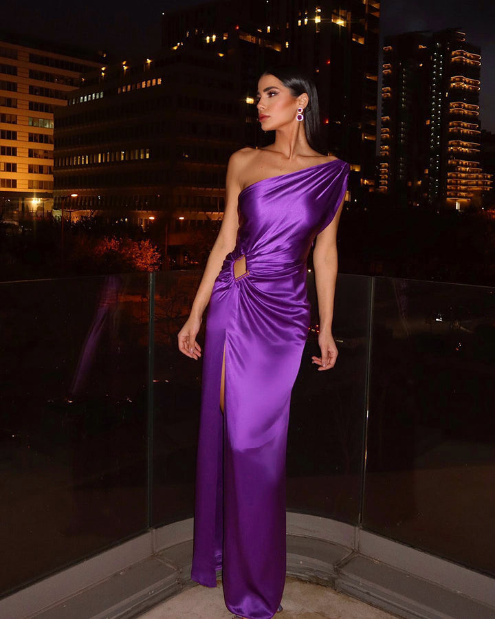 Women's glamorous evening dress with asymmetric cut and shimmering effect