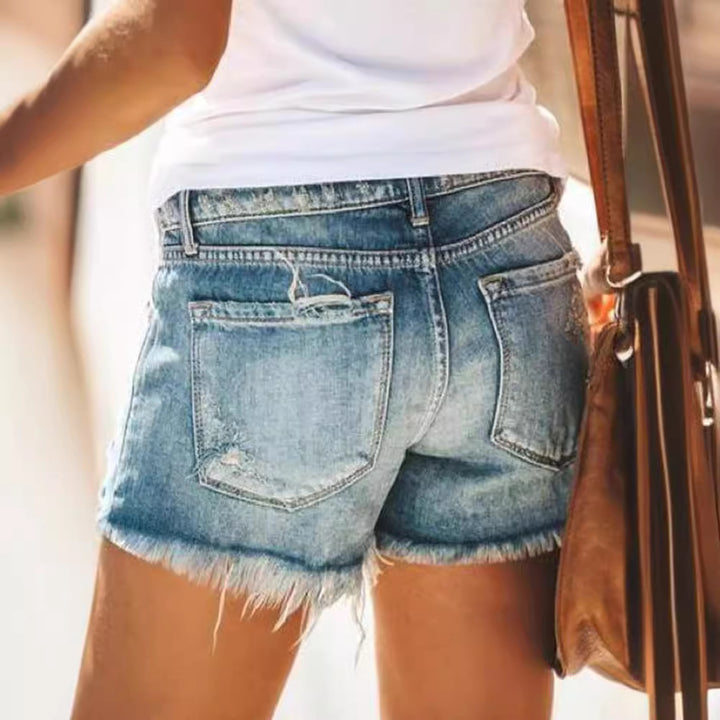 Ladies Destroyed Denim Shorts in a modern look with fringes Lisslune