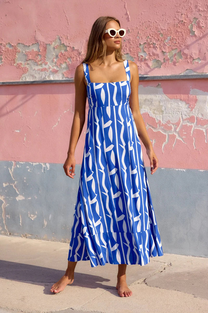 Ladies max dress with floral design and backless cut