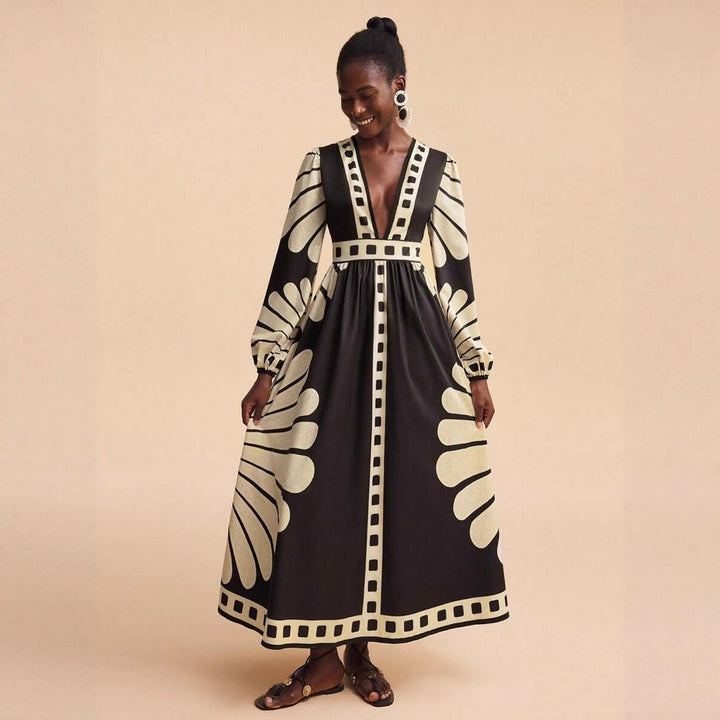 Women's maxi dress with deep V-neck and extravagant sleeve designs Lune London