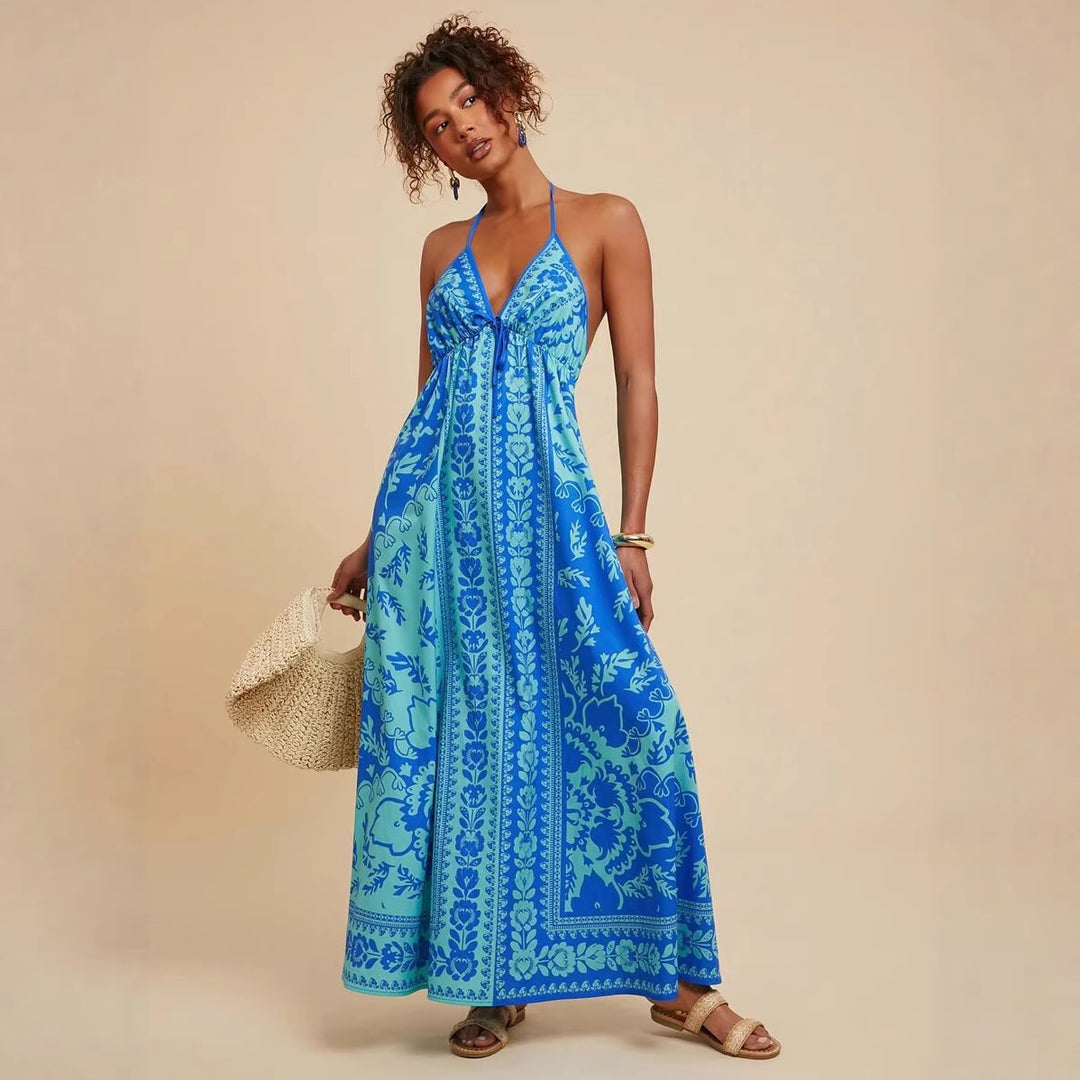 Women's maxi dress with deep V-neckline and floral pattern details Lune London