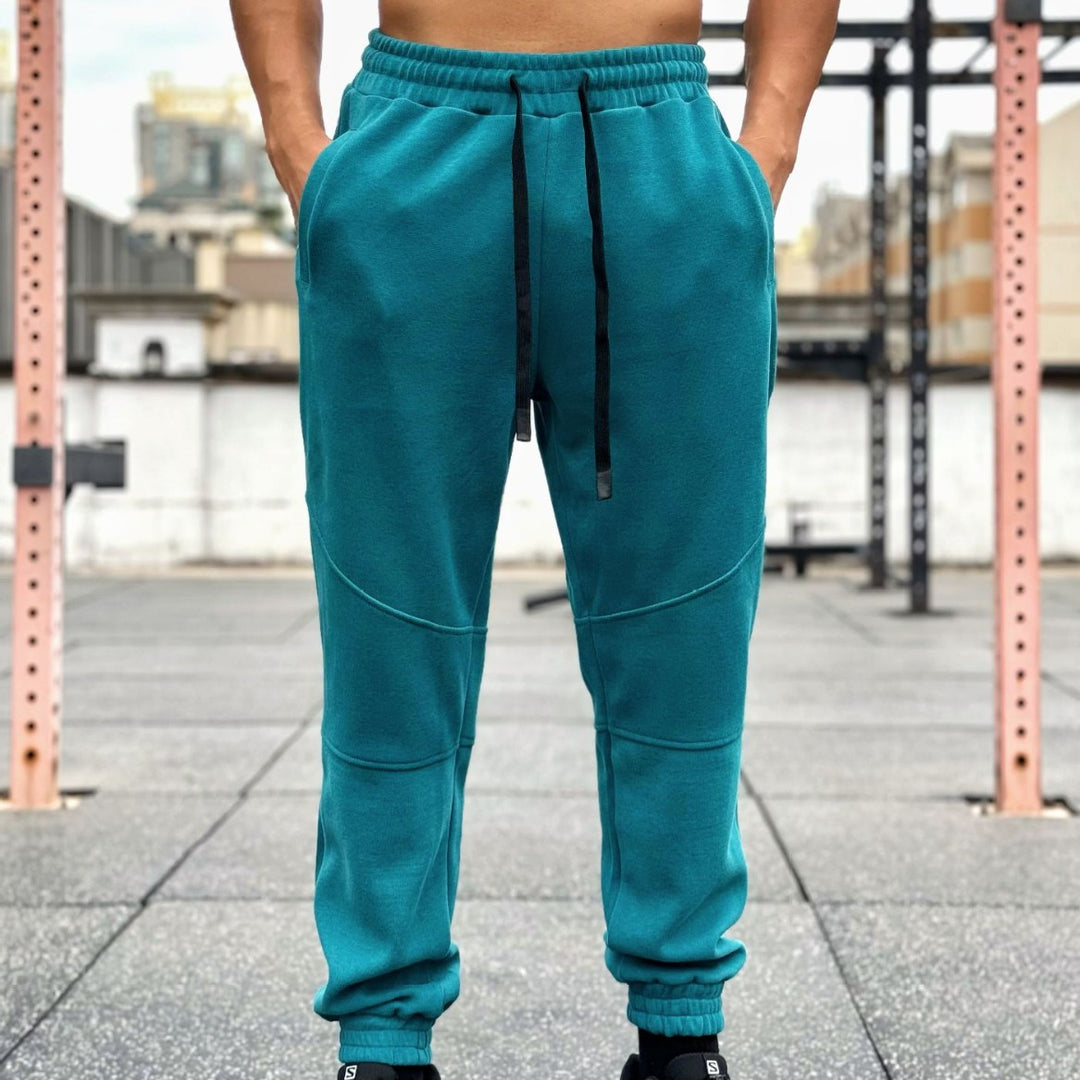 Men's sporty jogging pants with elastic waistband and practical side pockets Lisslune