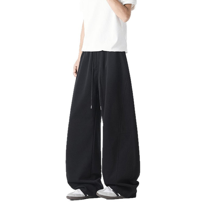 Men's casual, wide-cut leisure pants with elastic waistband and practical side pockets Lisslune