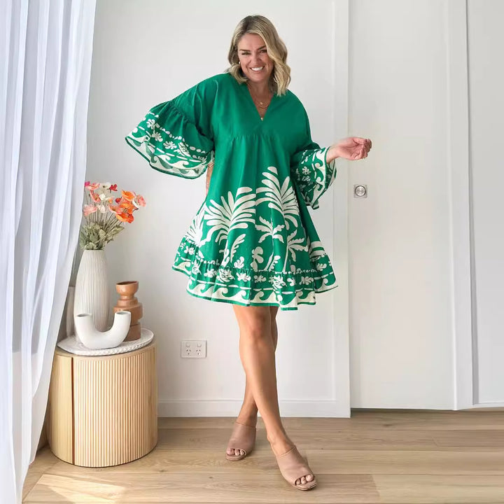 Women's casual dress with voluminous sleeves and structured ruffle details